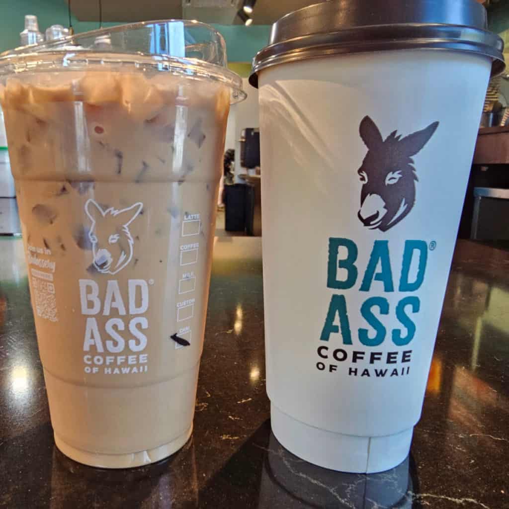 Bad Ass Coffee of Hawaii cups with an iced chai and a hot coffee
