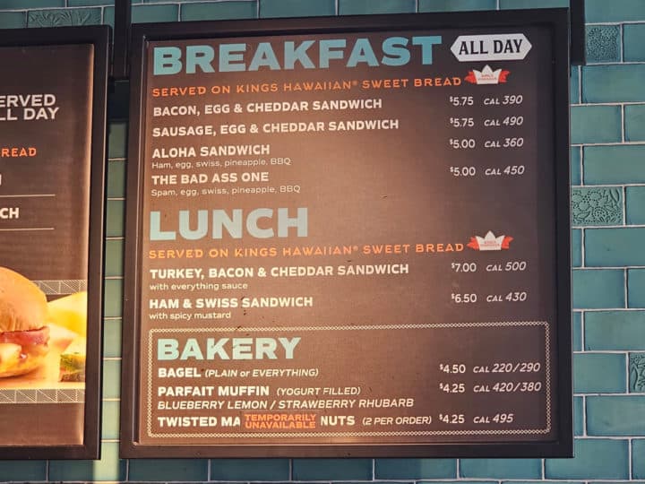 breakfast, lunch, and bakery menu on a large board