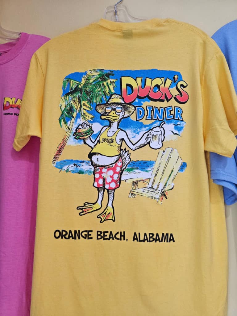 Yellow Duck's Diner Shirt with a cartoon duck Orange Beach, Alabama