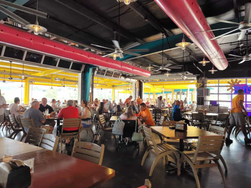 Indoor seating with people in LuLu's Gulf Shores