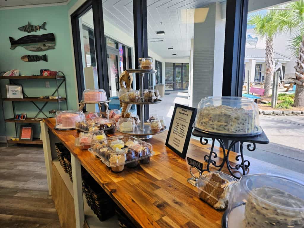 Cakes displayed on a wooden table at Deep South Cake Co