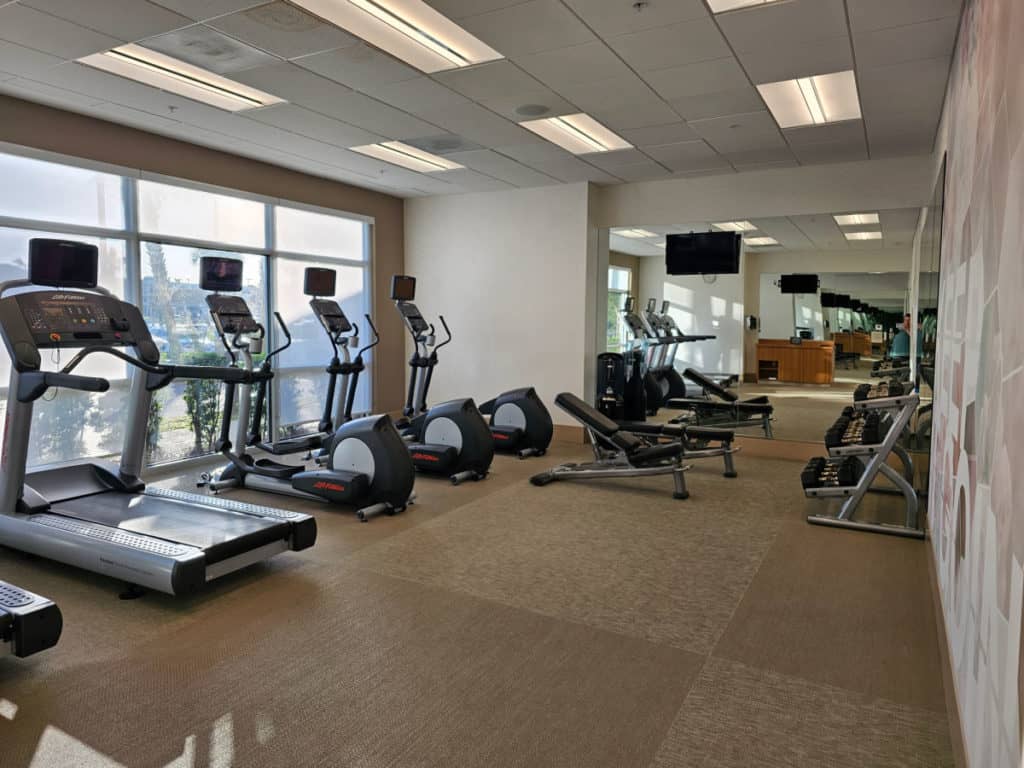 Fitness center with treadmills, elipticals, weight bench and free weights at the Marriott Springhill Suites Orange Beach