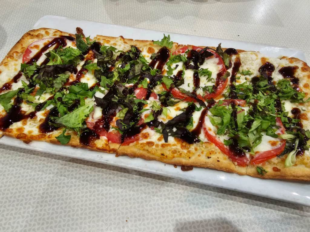 Margherita Flatbread with balsamic glaze at Island Wing Company