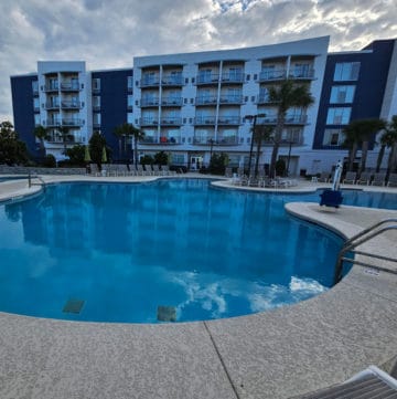 Exterior pool and multi story Springhill Suites Hotel in Orange Beach