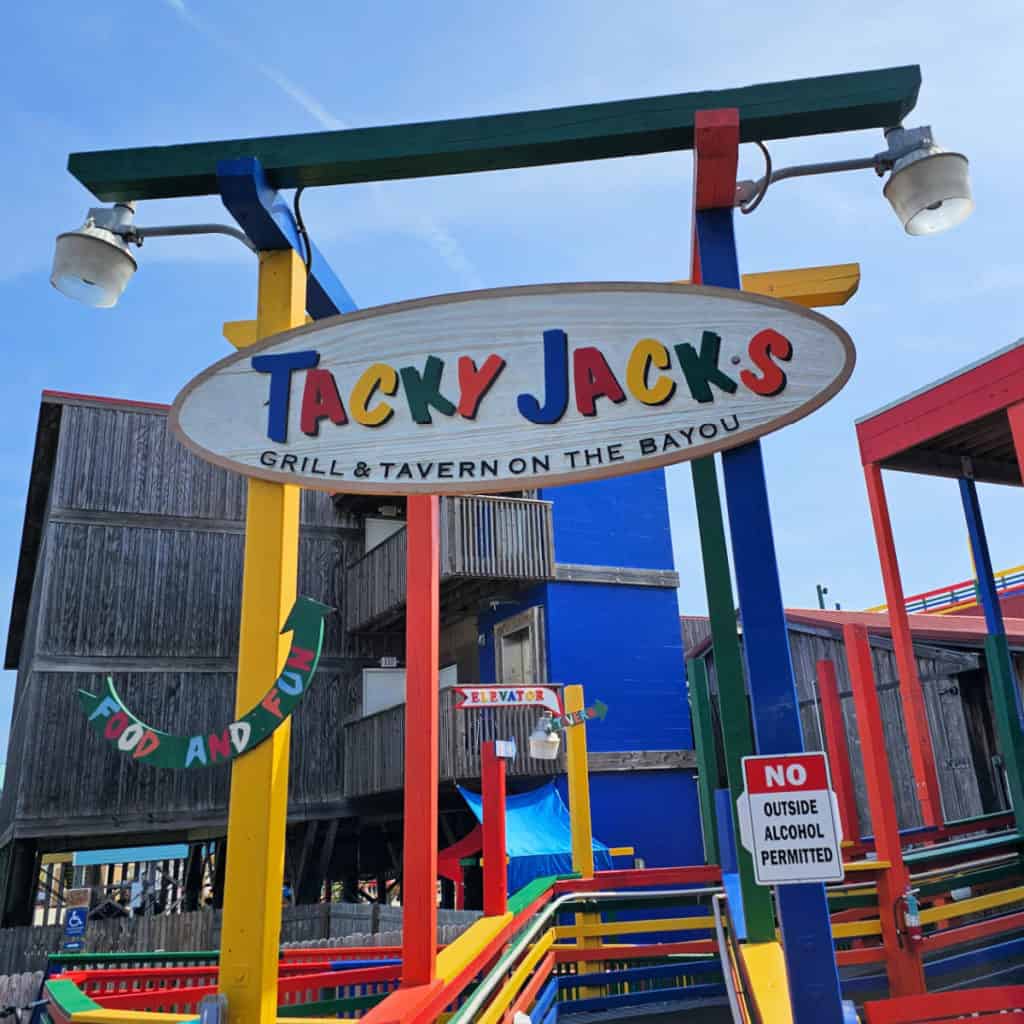 Tacky Jacks Grill and Tavern entrance with brightly colored painted wood