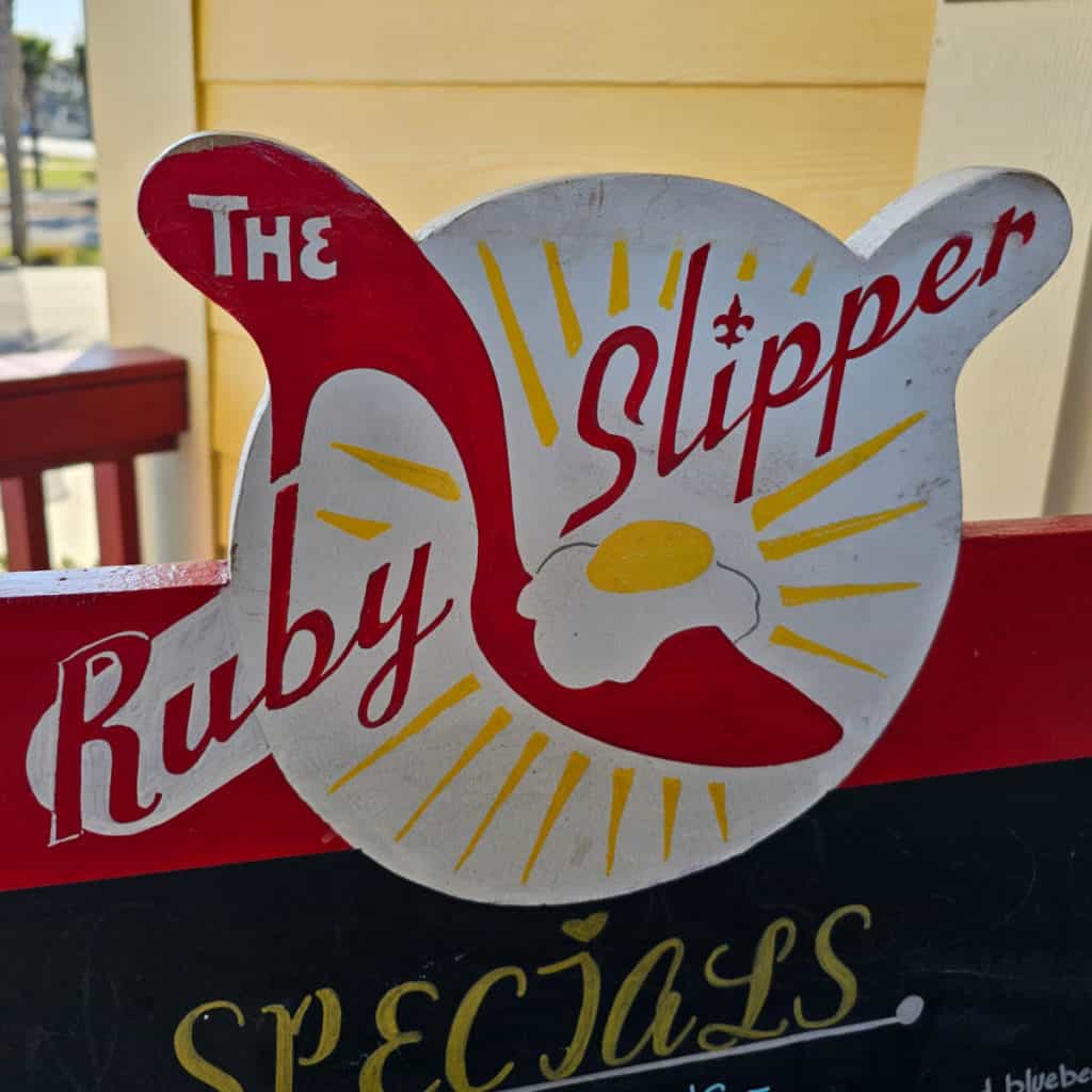 The Ruby Slipper with poached egg sign