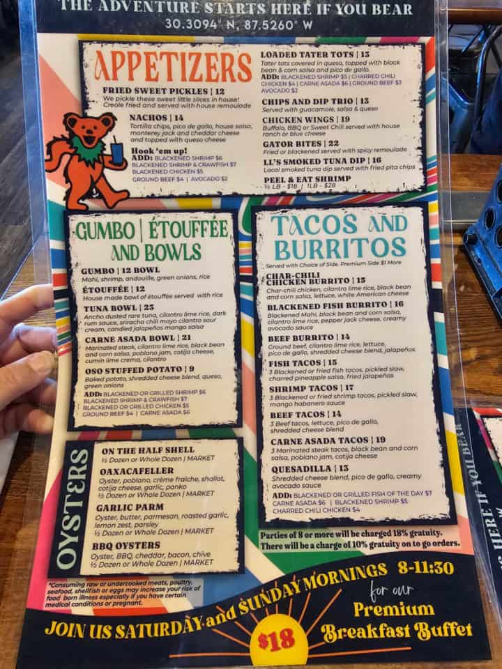 OSO Restaurant menu with appetizers, gumbo etouffee and bowls, oysters, tacos and burritos with a dancing bear holding a glass on it