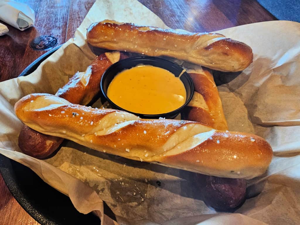 stack of pretzels surrounding cheese dip at OSO Bear Point