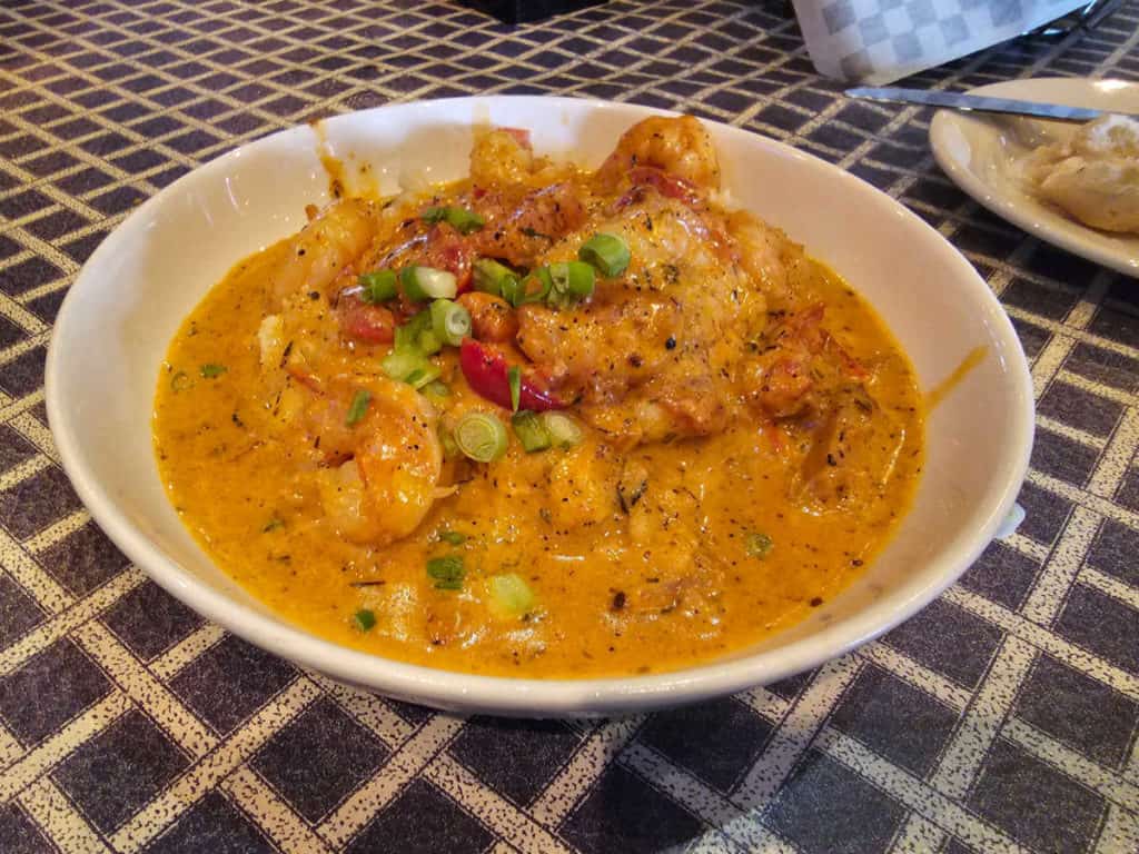 Shrimp and Grits in a white bowl
