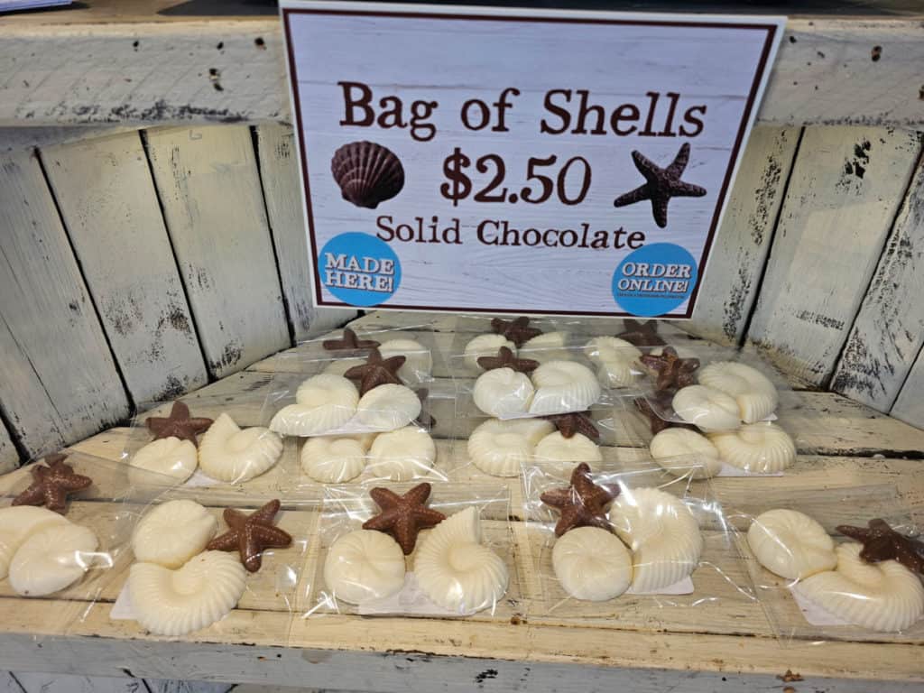 Bag of shell and starfish chocolates on display