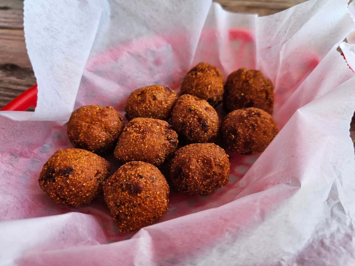 Hushpuppies in a paper lined red basket