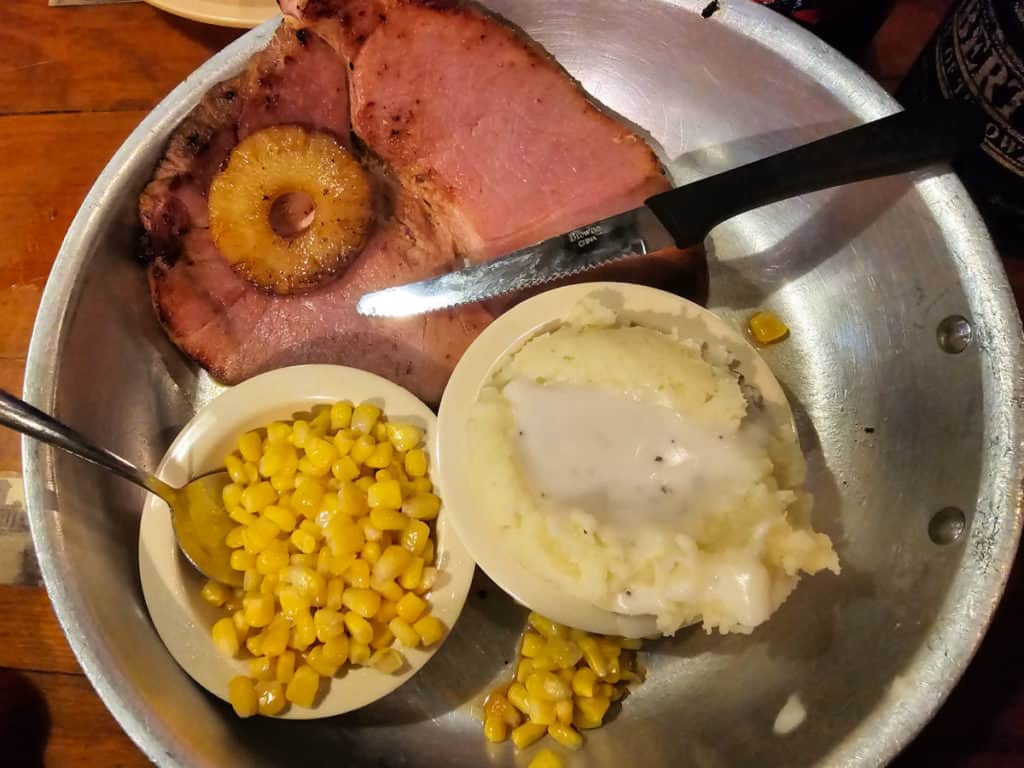 Center Cut Ham Steak with mashed potatoes and gravy and corn