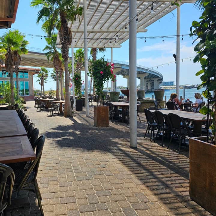 cobalt restaurant outdoor seating with a view of the Perdido Bay bridge and Gulf