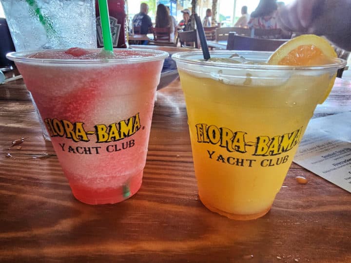Two cocktails in Flora-Bama Yacht Club glasses