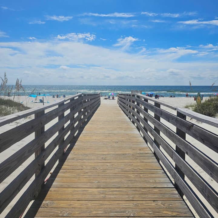wooden boardwalk leading to the Cotton Bayou Public Beach