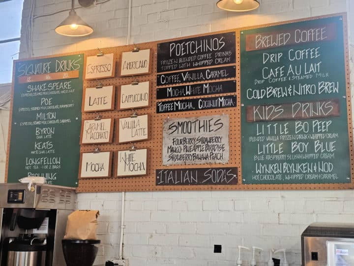 Drowsy Poet menu with author names for drink names on a large board