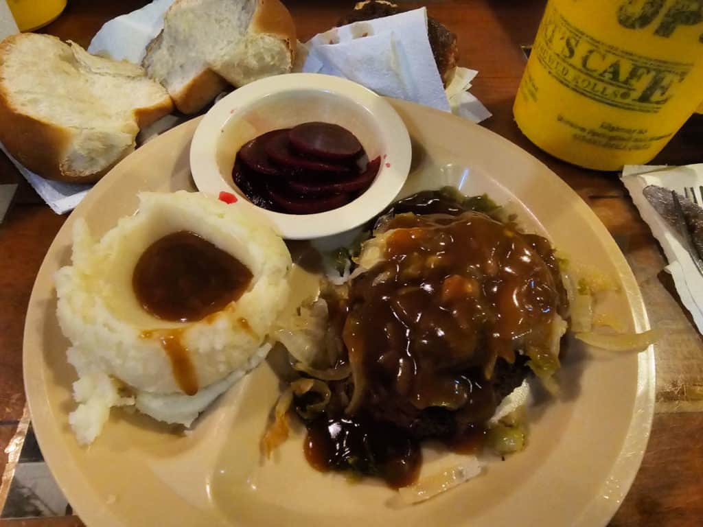 https://gulfcoastjourneys.com/wp-content/uploads/2023/09/Hamburger-Steak-with-Mashed-Potatoes-and-Beets-Lamberts-Cafe-Foley-Alabama-1024x768.jpg