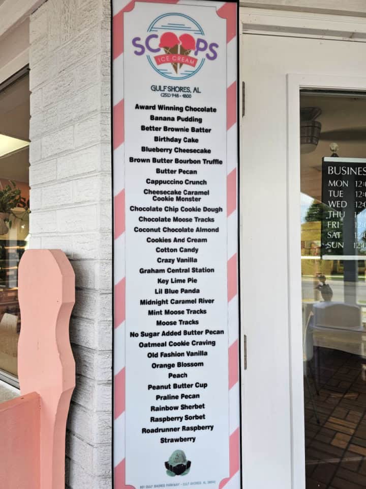 Scoops Ice cream flavor list on a printed board by the door