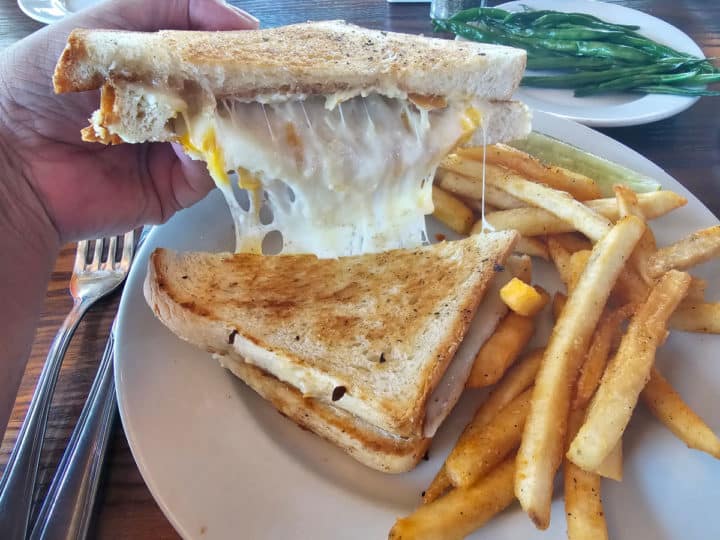 Super Grilled cheese with French Fries at Cobalt on a white plate