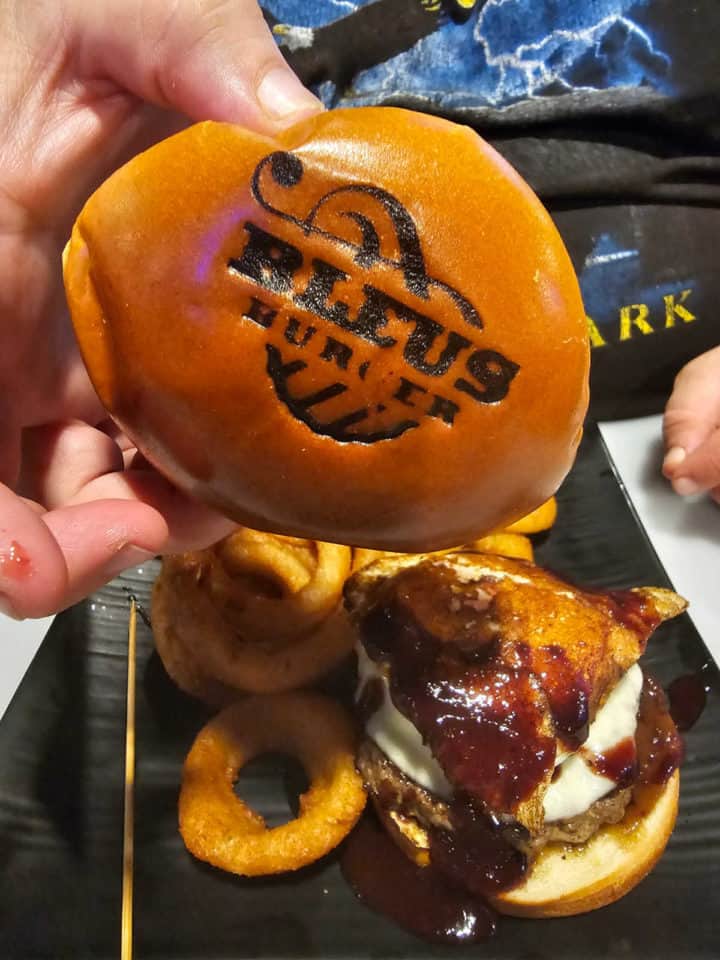 Bleus Burger imprinted on a hamburger bun