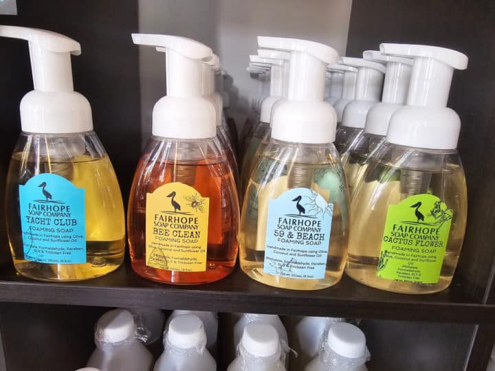 Fairhope soap foaming soap bottles lined on a shelf