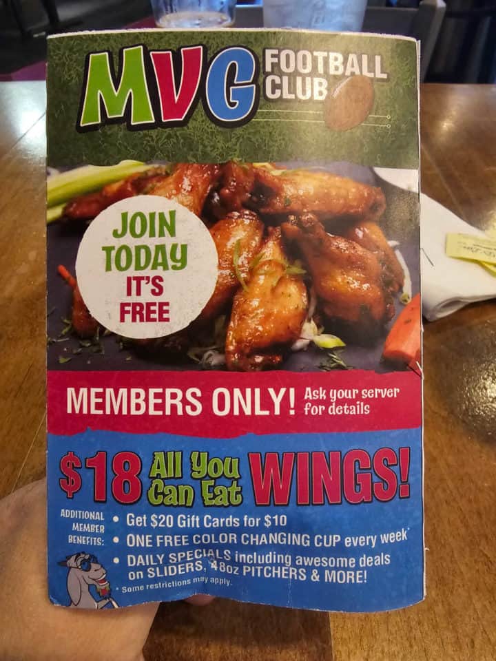 MVG Football club with a photo of wings and $18 all you can eat wings