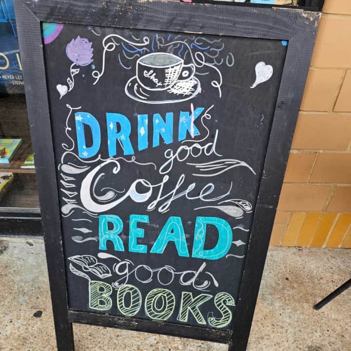 Drink good coffee read good books sign
