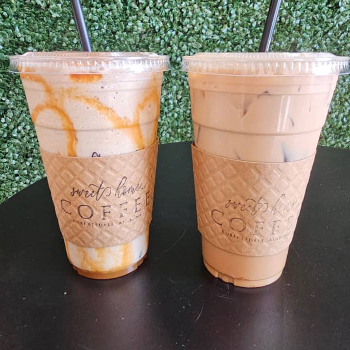 Two Sweet Home Coffee iced drinks on a dark table 