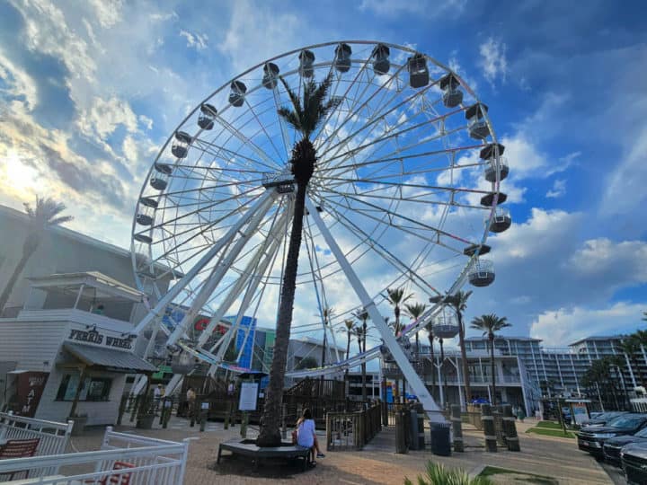 The Wharf Ferris Wheel with clouds and blue sky