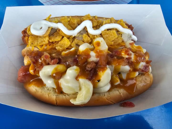 wacky macky hot dog and frito pie hot dog in a paper container. 