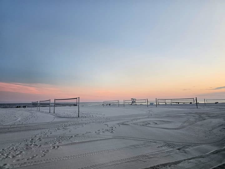 Beach volleyball nets at sunset on the beach