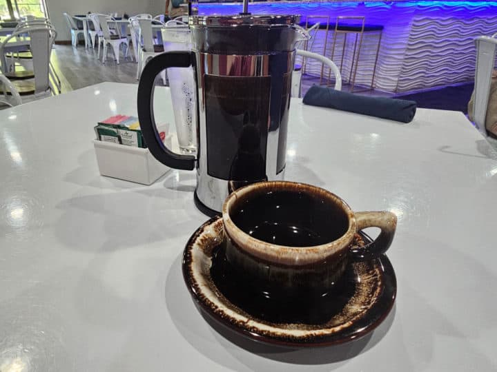 Kopi Luwak coffee service with dark coffee mug