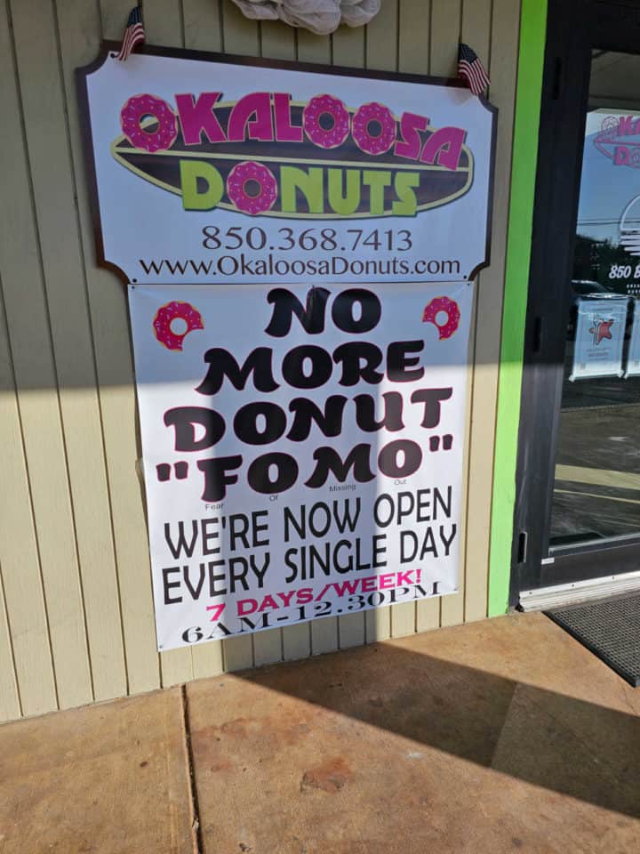 No More Donut Fomo sign with Okaloosa Donuts logo