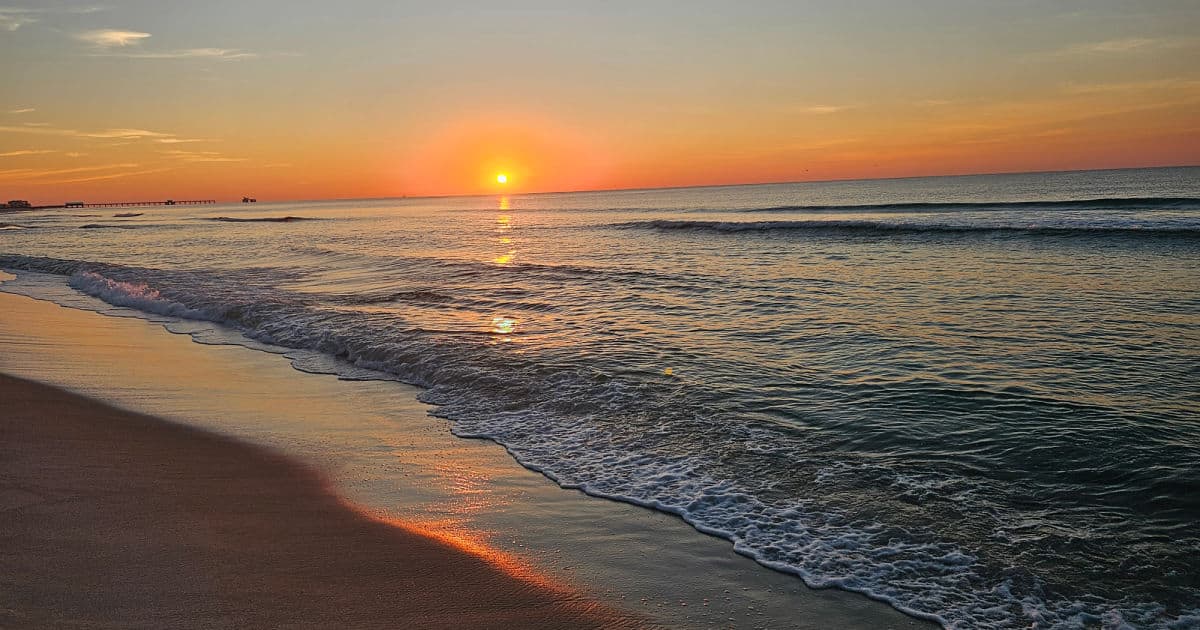 Experience the Breathtaking Sunrise in Orange Beach, AL: A Travel Guide