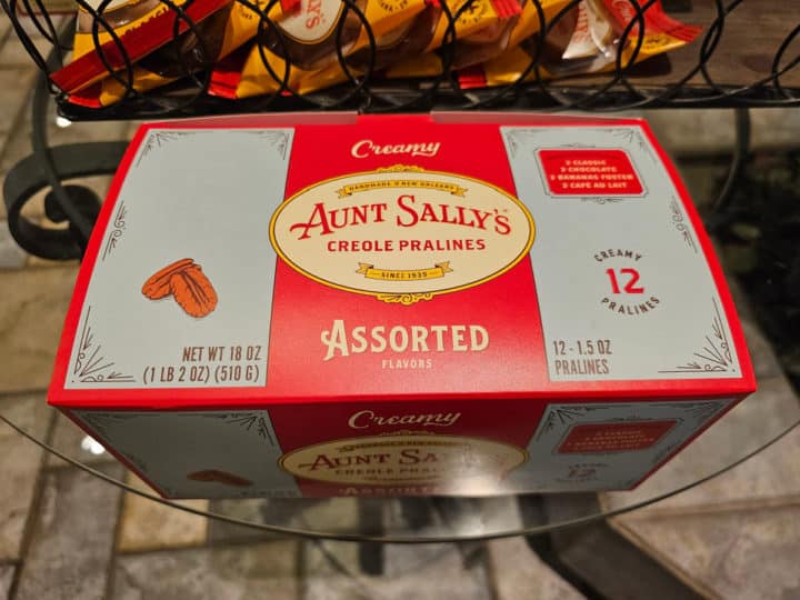 Box of Aunt Sally's Creole Pralines on a glass table