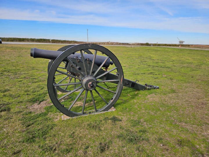 historic cannon on a grass field