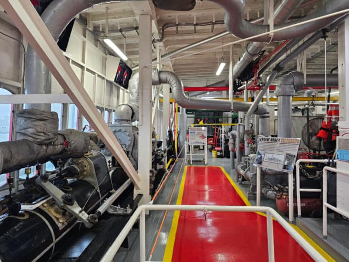 engine room with red paint on the floor leading you in specific spaces