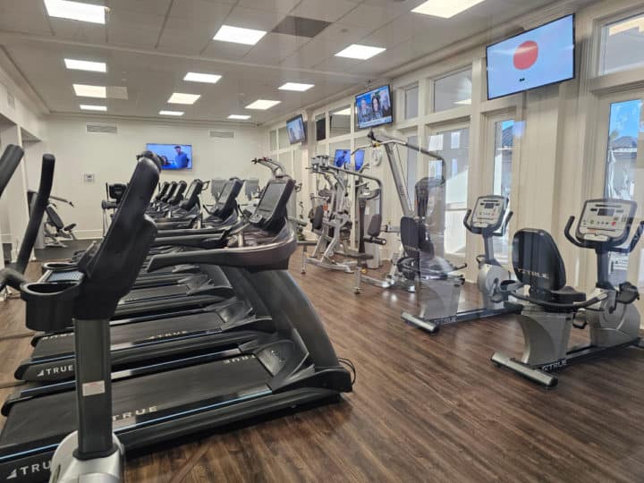 gym with treadmills and weight machines