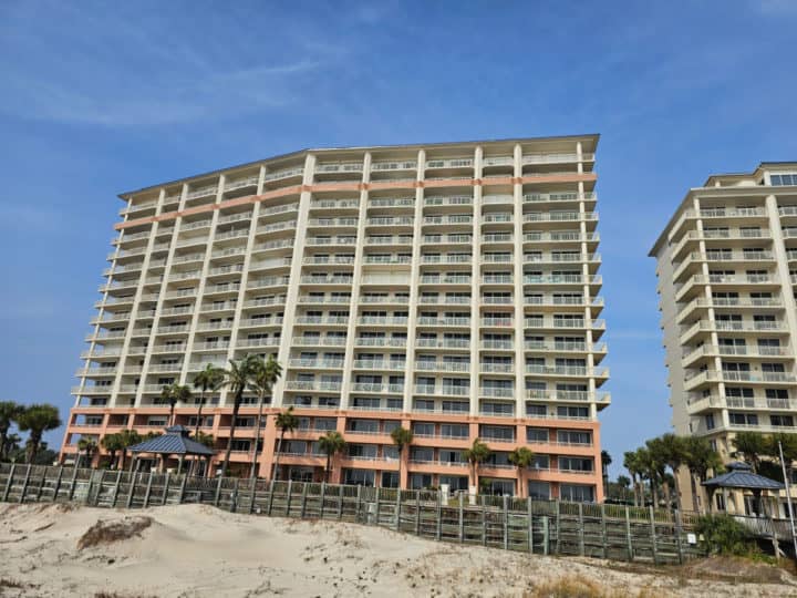 tall condo building from the beach