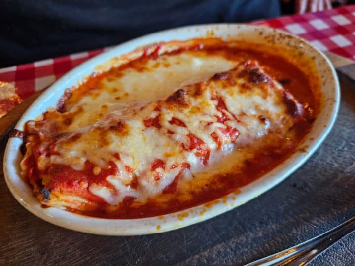 Lasagna baked in a white dish