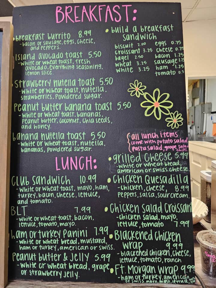 breakfast and lunch menu on a chalkboard sign