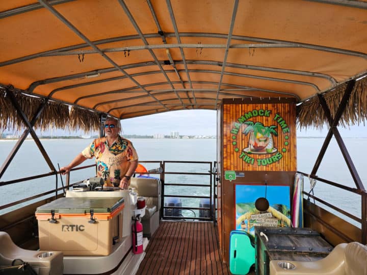 Captain Glenn driving the Hammock Time Tiki Tour boat 