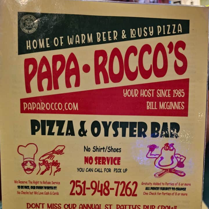 Papa Rocco's Menu with Home of Warm Beer and Lousy Pizza on it