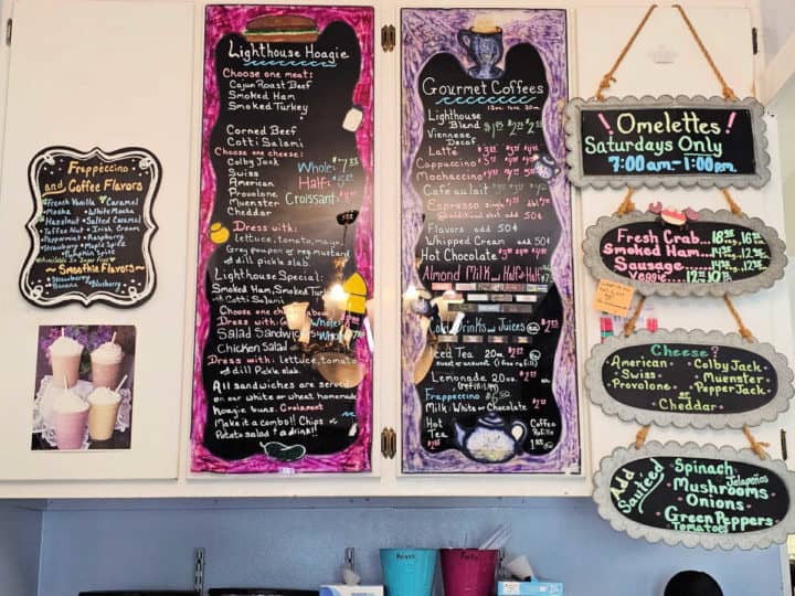 Lighthouse bakery menu on chalkboards hanging on the wall 
