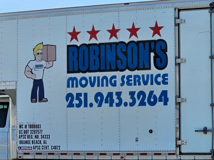 Robinson's Moving Service truck with cartoon guy holding a box