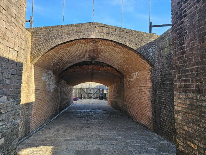 brick covered walkway entrance into Fort Gaines. 