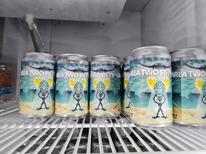 Area two Fifty One Hazy IPA cans in a refrigerator