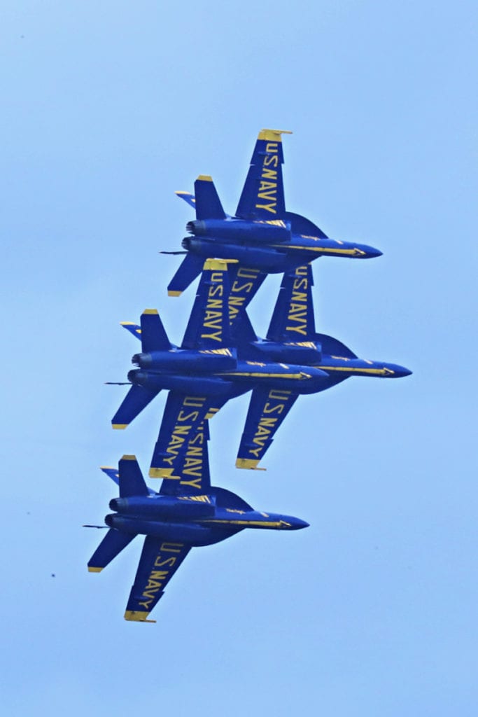 Four Blue Angel Jets in tight diamond formation