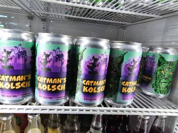 Catman's Kolsch beer cans in a fridge
