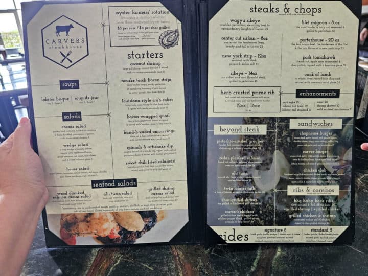 Carvers Steakhouse logo in the top corner with steak, salad, and chicken menu